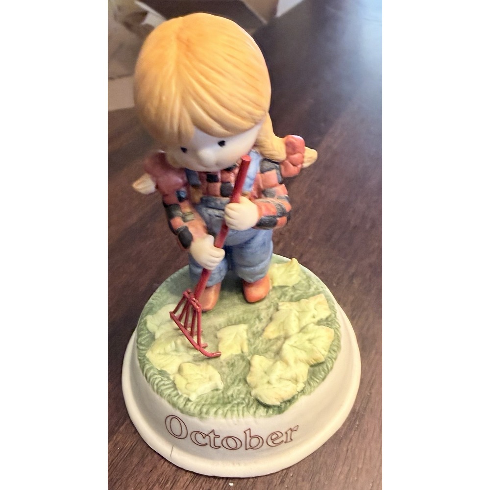 Enesco Country Cousins October Katie Raking Leaves